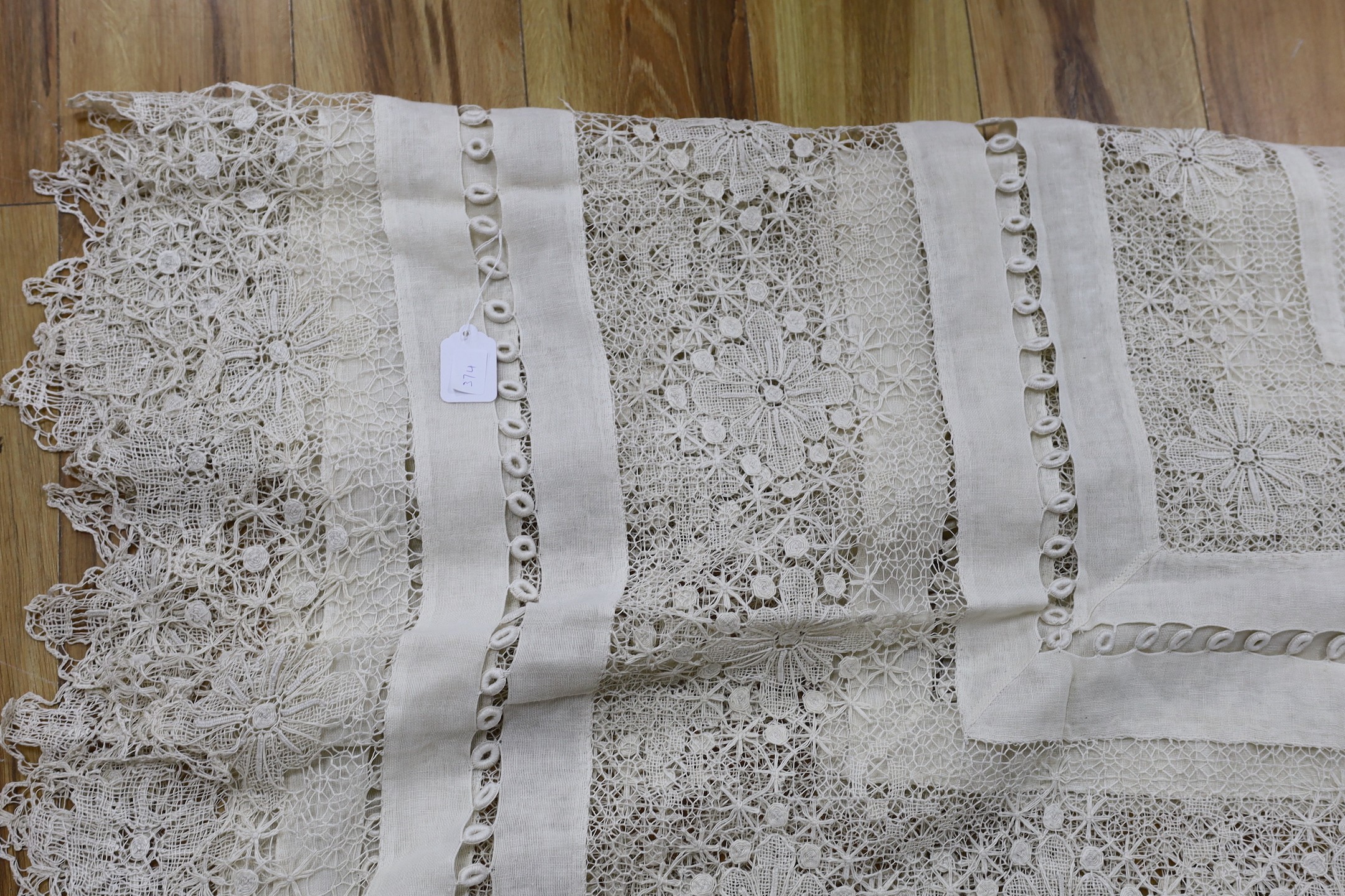 An ornate handworked and linen bedspread, 240 cms x 280 cms
